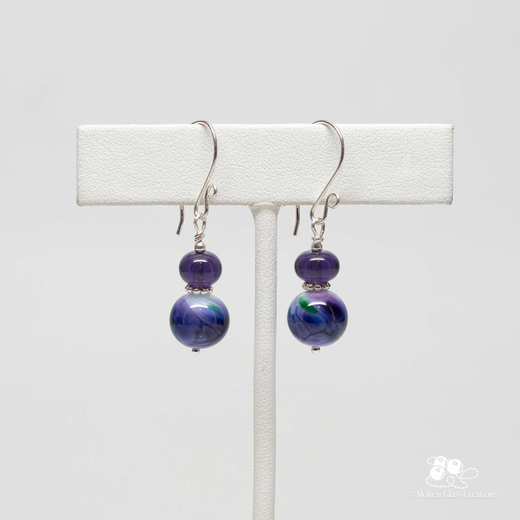 earrings with a purple marble style look