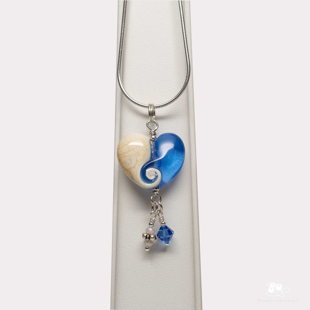 blue and ivory swirl glass heart necklace