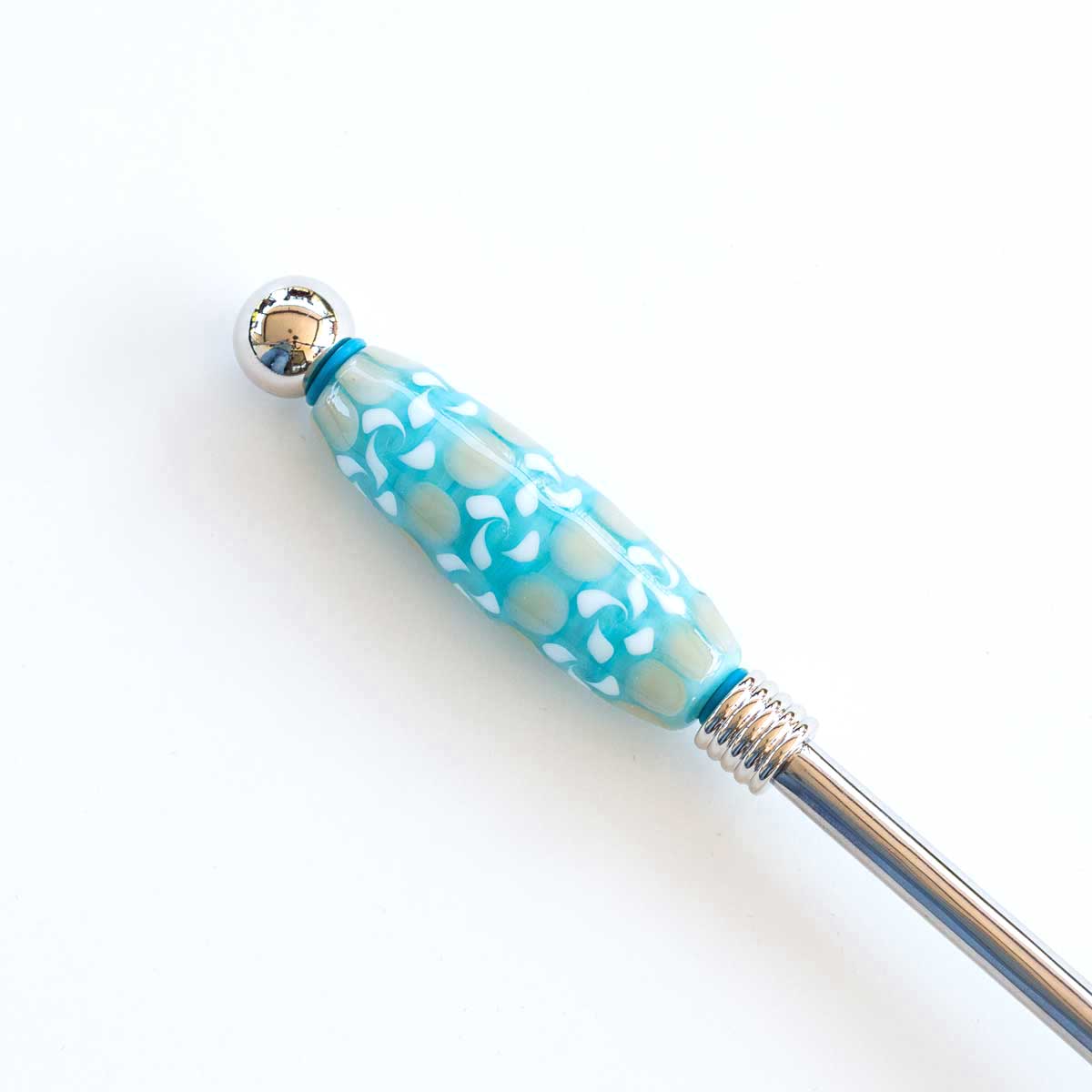 blue twisted beaded soup ladle