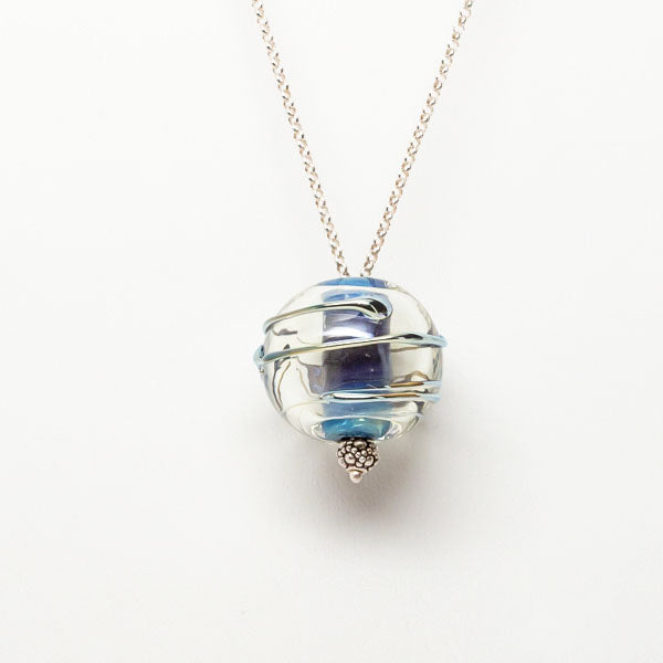 clear hollow bead with blue core and silver chain