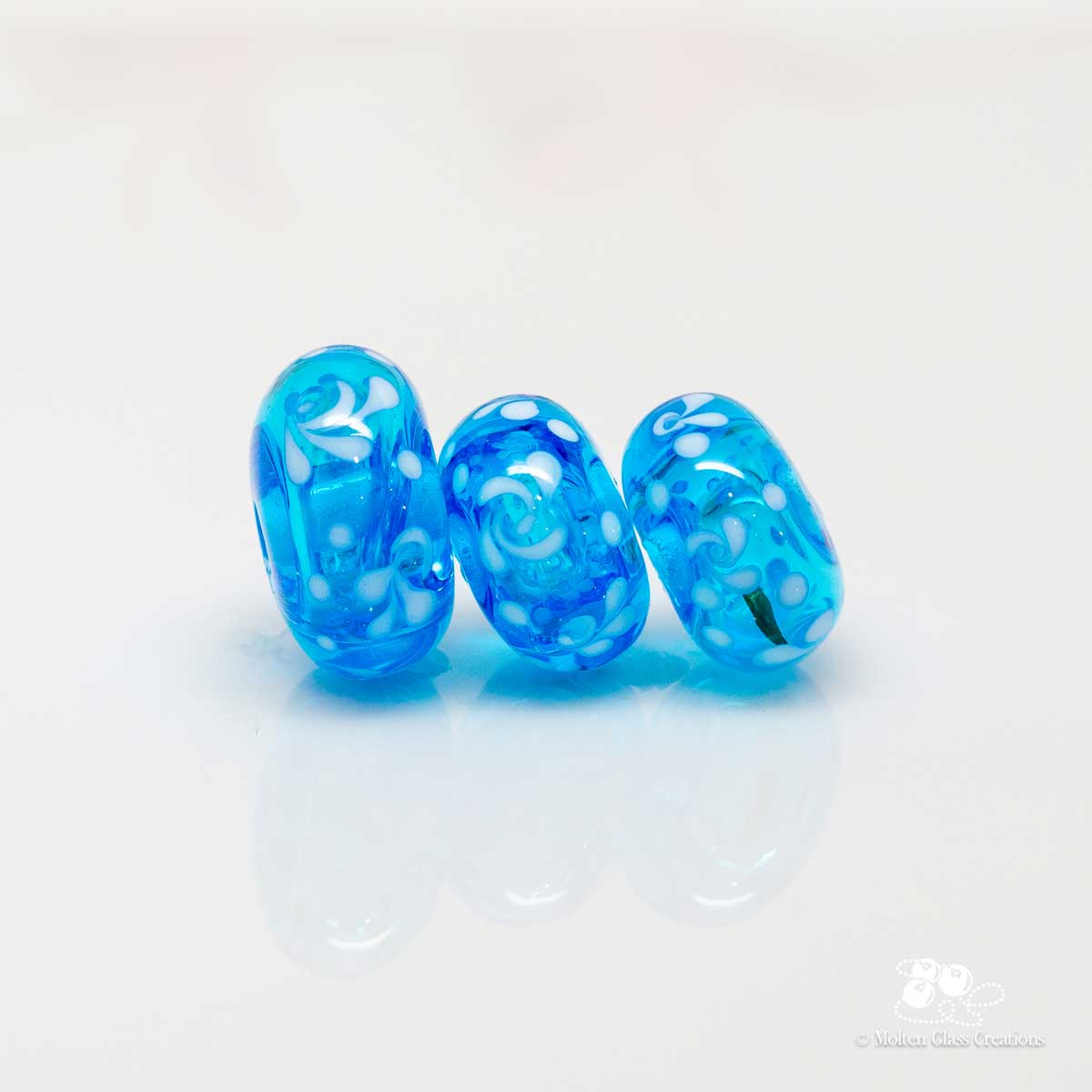 Hollow Beads - Blue Pinwheels - Molten Glass Creations